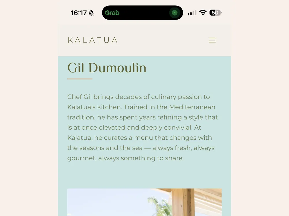 Placeholder: photo of a guest browsing the old site on a phone at the beach